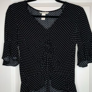 Black polka dot shirt